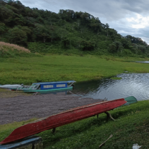 Pontoon boat ride on Arenal Lake during the La Fortuna to Monteverde transfer." Title: "Pontoon Boat Ride on Arenal Lake